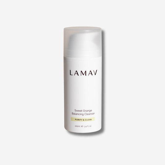 A bottle of LAMAV Sweet Orange Balancing Cleanser with 'Purify & Clean' label, containing 100ml or 3.4 fl oz.