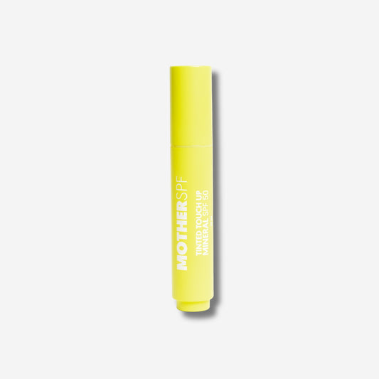 Mother SPF Tinted Touch Up SPF50 in bright yellow tube for sun protection