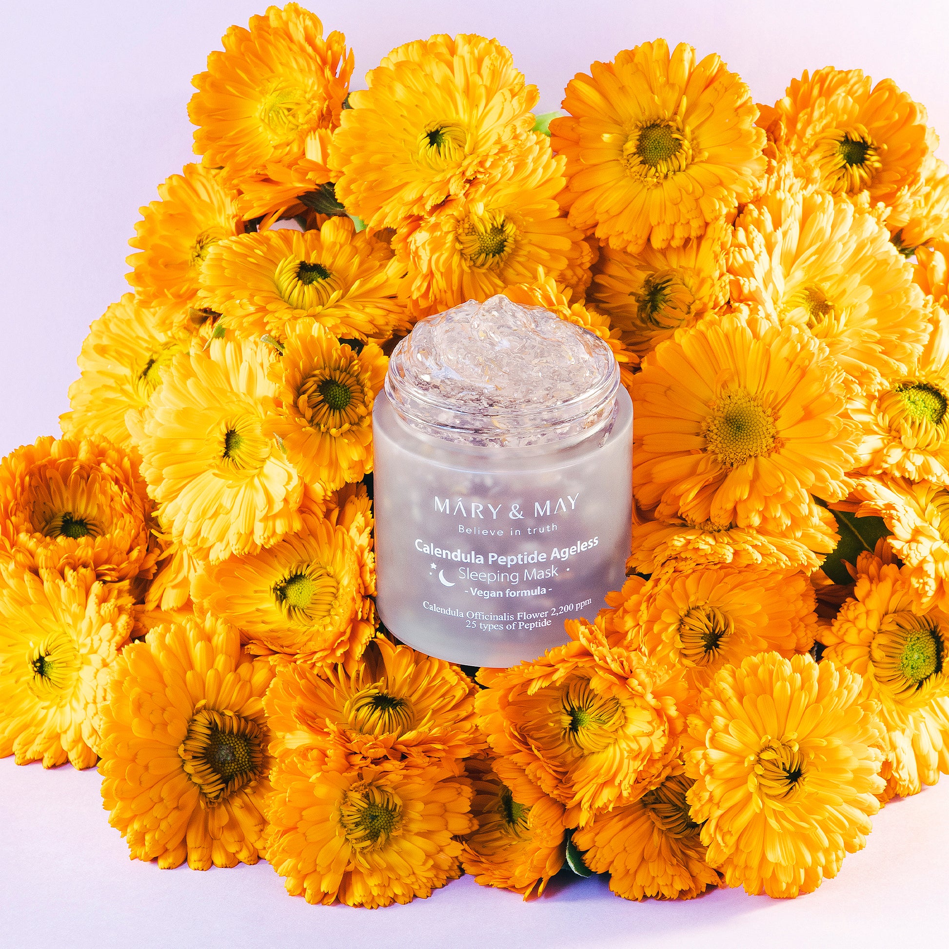 A white jar of OOTD Snail Mucin Lifting Cream with advanced skincare technology for comprehensive elasticity and anti-aging excellence.