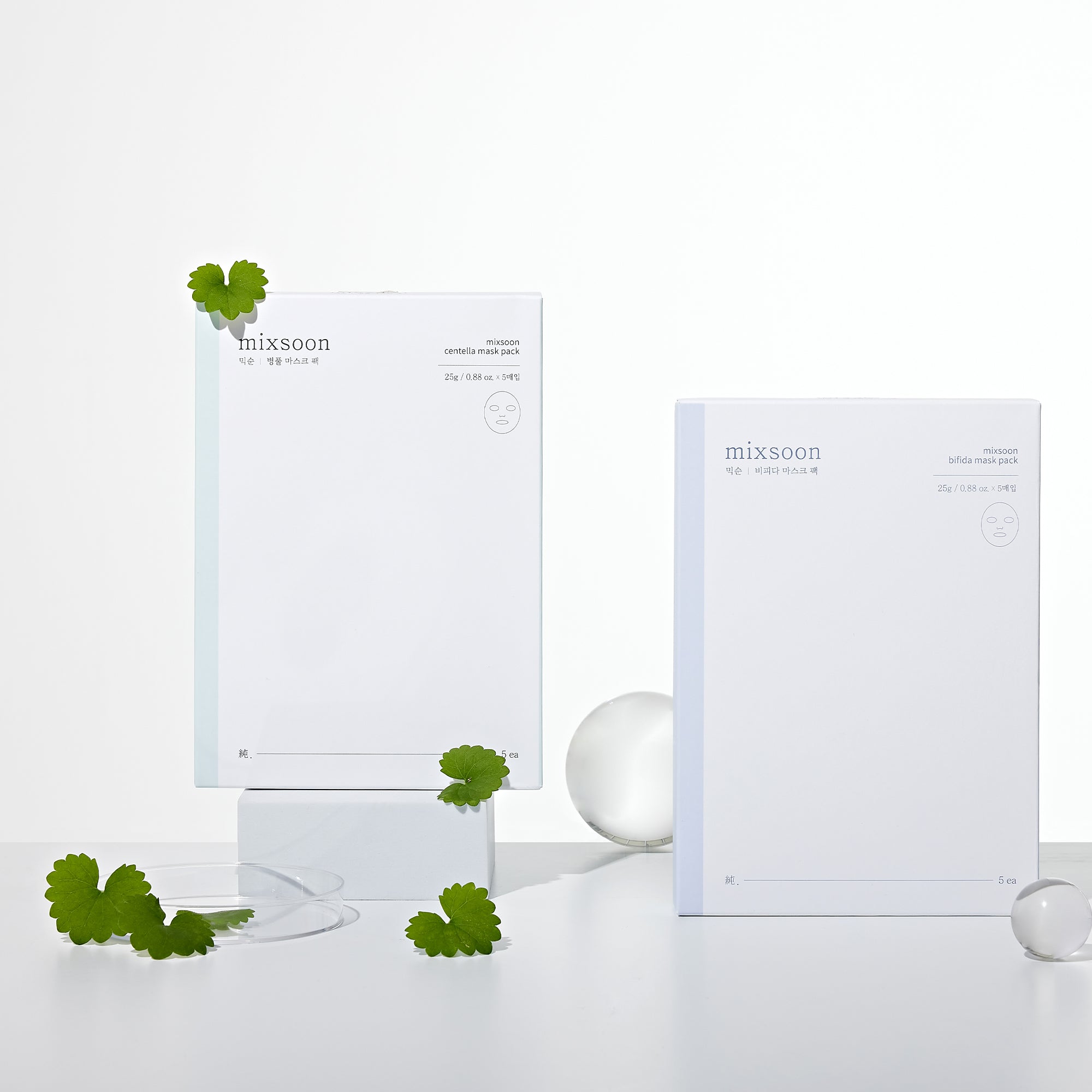 Mixsoon Centella Asiatica Mask Pack with plant leaves and minimal design in a bright setting.