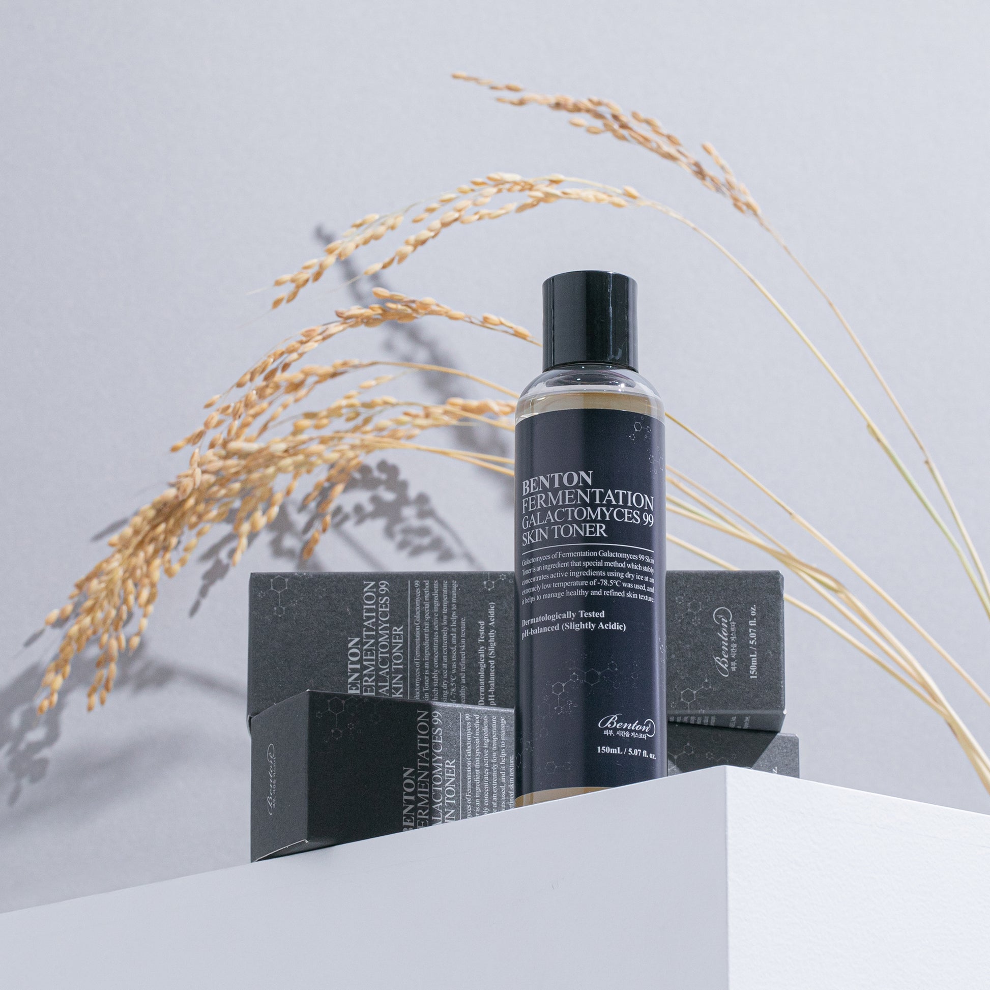 Benton Fermentation Galactomyces 99 Skin Toner bottle with packaging on white surface.