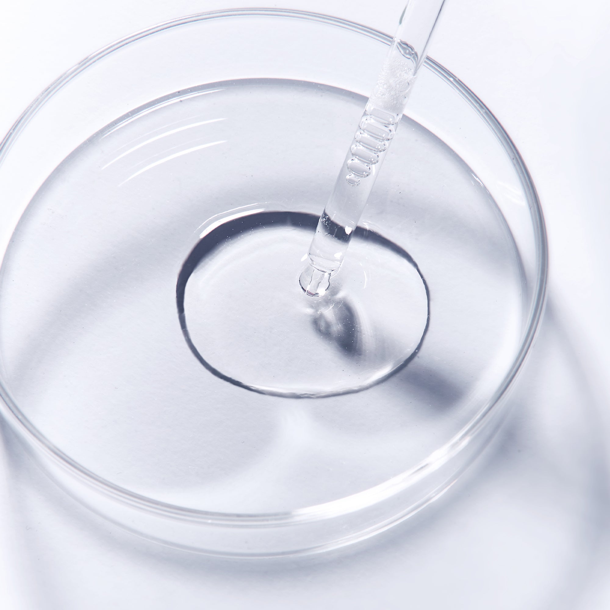 Galactomyces toner with dropper in glass petri dish for skincare