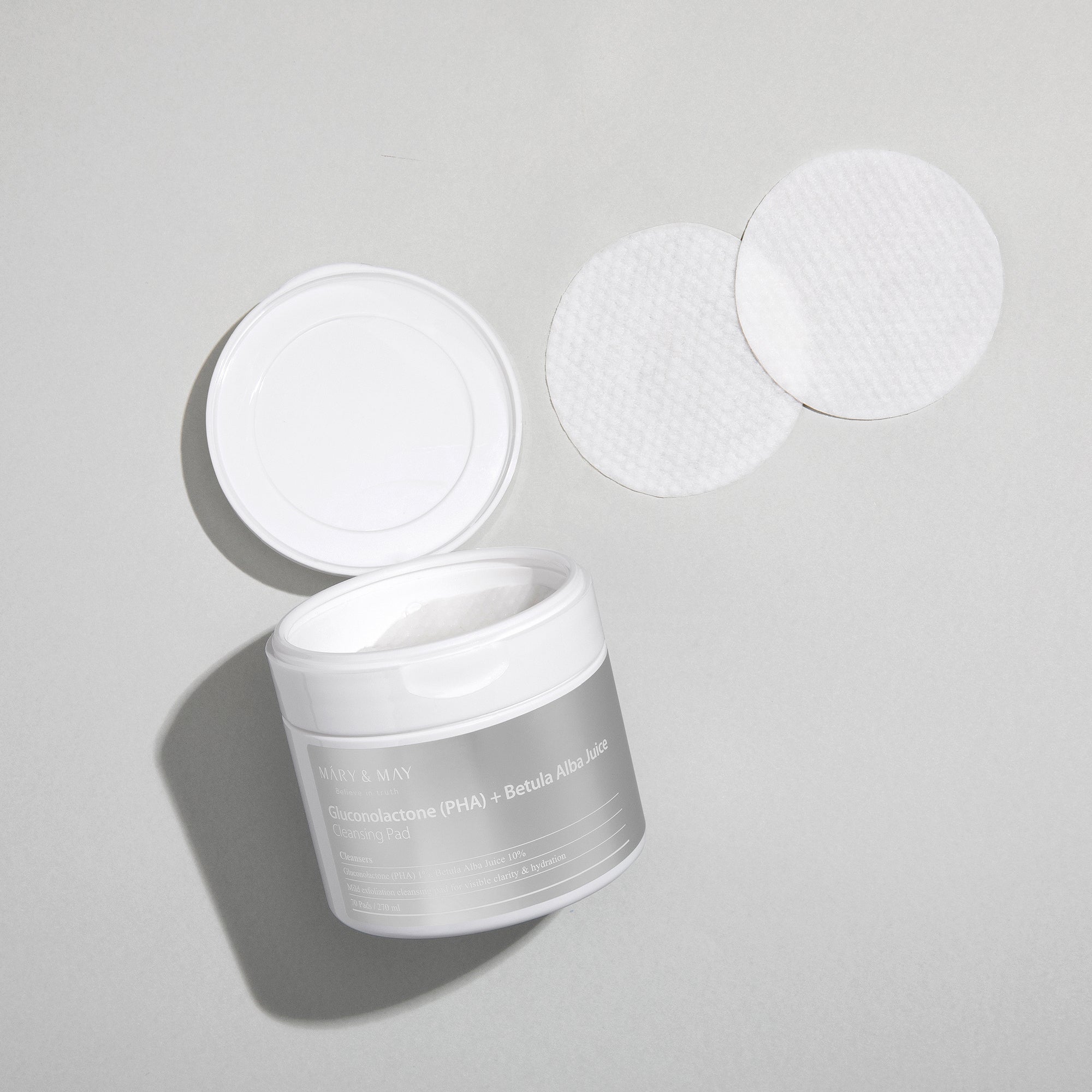 Mary & May Gluconolactone PHA Betula Alba Juice Cleansing Pad with open container and two pads.