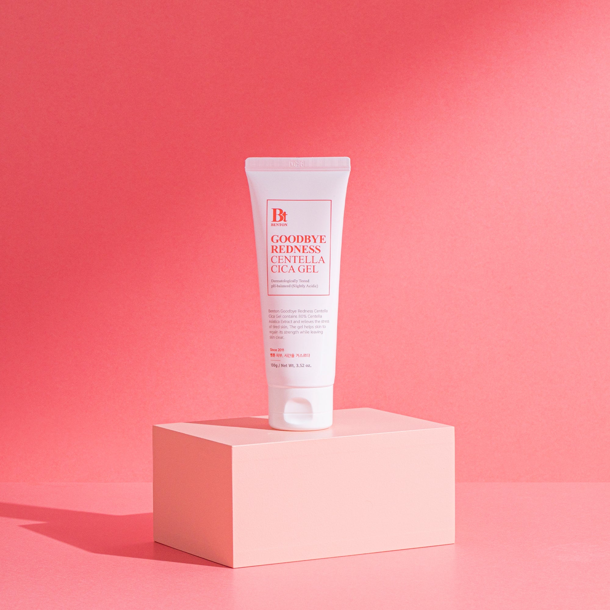Benton Goodbye Redness Centella Cica Gel on pink pedestal against pink background.