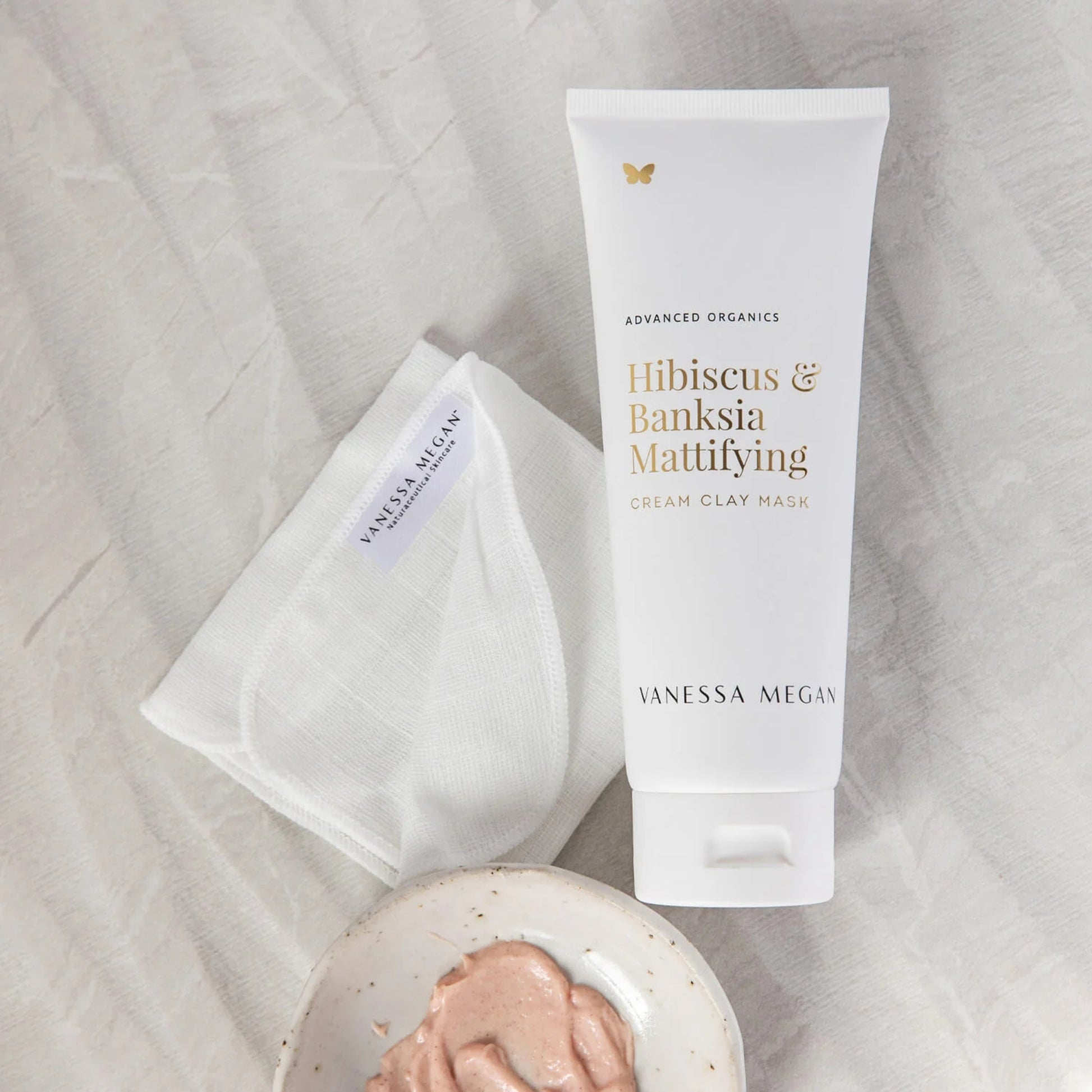 Vanessa Megan Hibiscus & Banksia Mattifying Cream Clay Mask on a textured surface