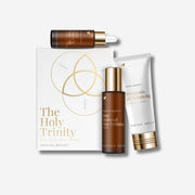 Vanessa Megan The Holy Trinity Set including a serum, cream cleanser and face oil on a white background.