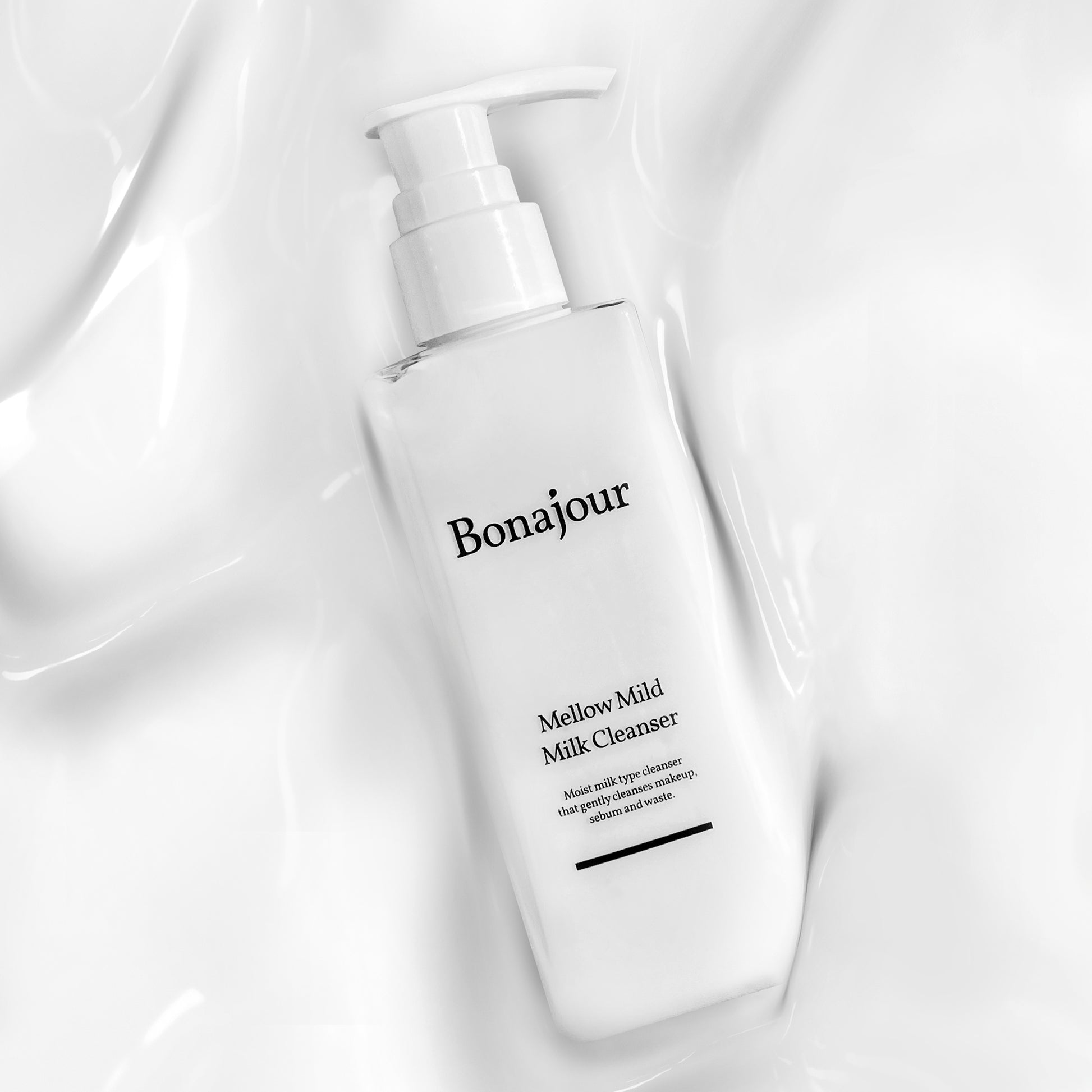Bonajour Mellow Mild Milk Cleanser with pump on a textured white background