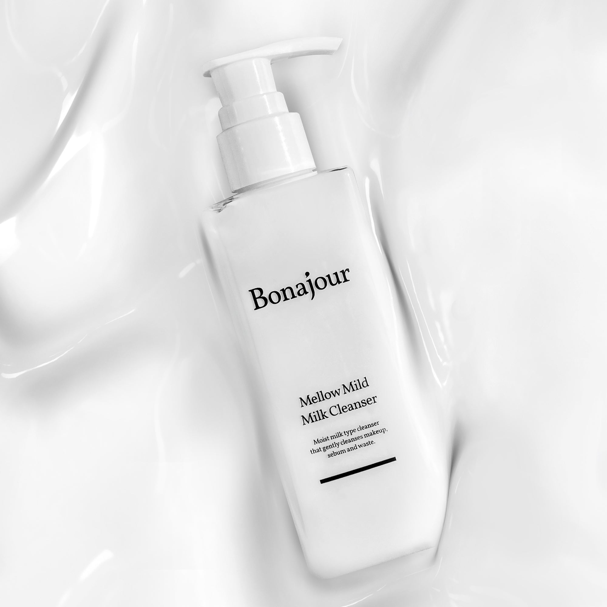 Bonajour Mellow Mild Milk Cleanser with pump on a textured white background