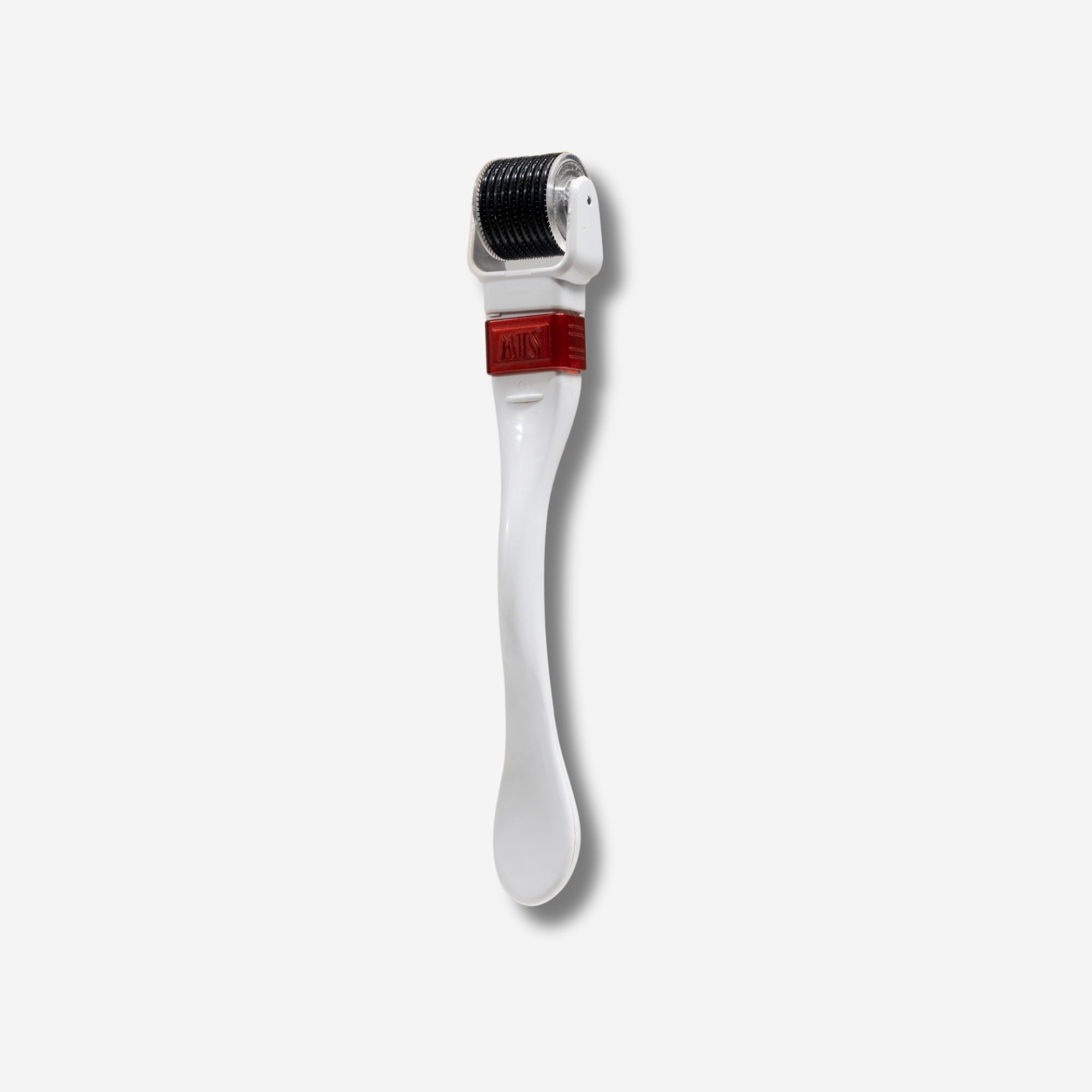 White derma roller with red accent and micro-needles on head for skincare.