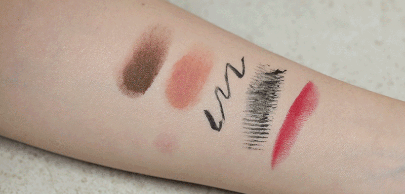 Arm with makeup swatches removed using One Step Cleansing Pad from Mizon