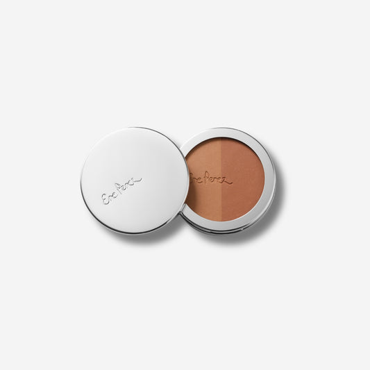 Open compact of Rice Powder Blush with two shades, featuring a sleek silver lid with engraved script.