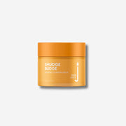 Skin Juice Smudge Budge calming cleansing balm in orange jar, 70mL.