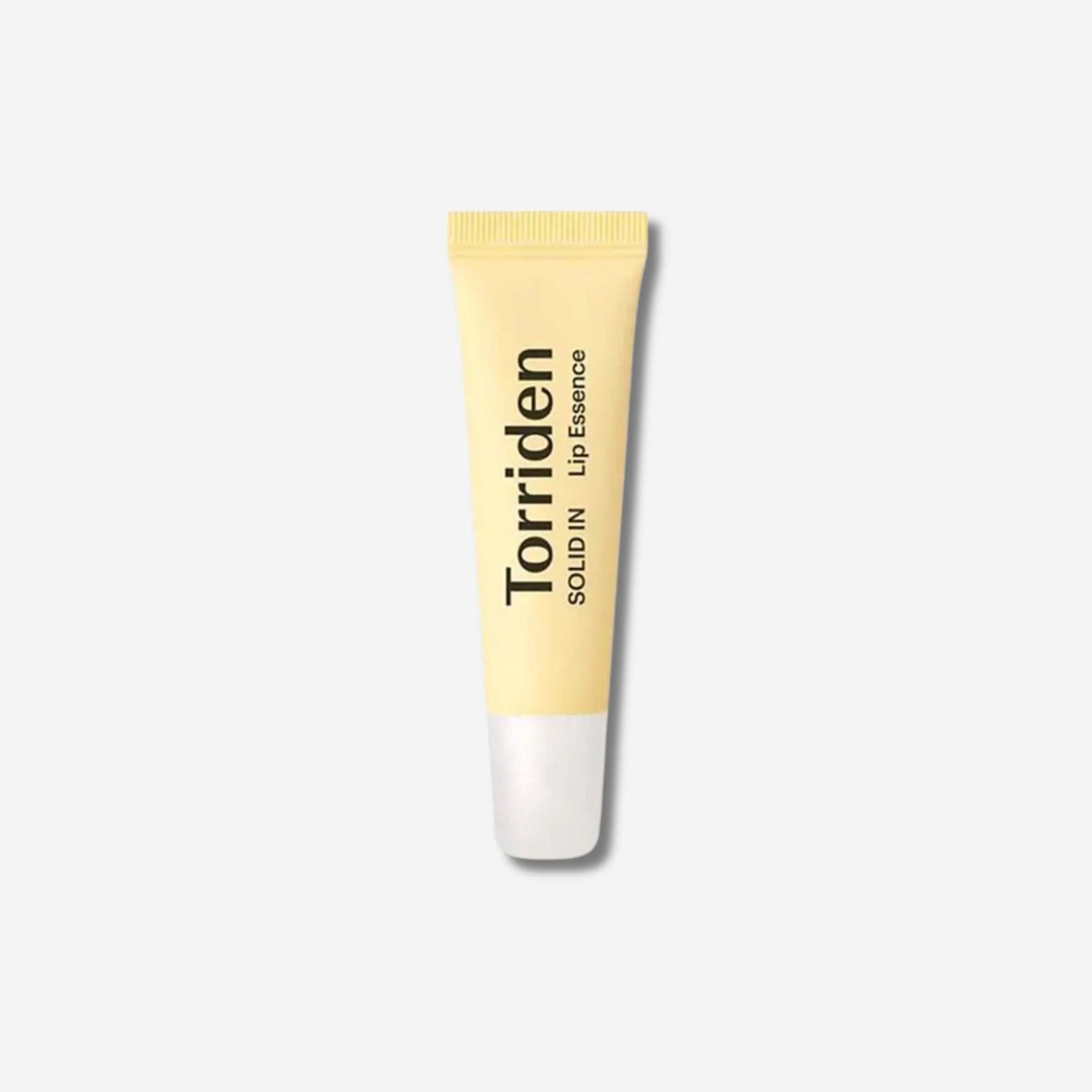 Torriden SOLID IN Ceramide Lip Essence tube, 11ml, yellow packaging on white background.