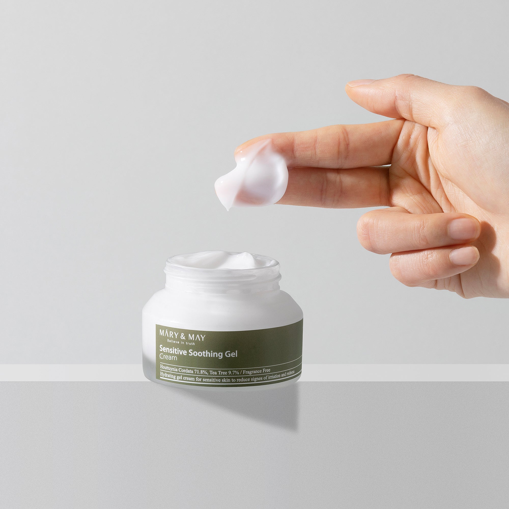 Mary & May Sensitive Soothing Gel Cream for calming sensitive skin, shown with hand applying product.