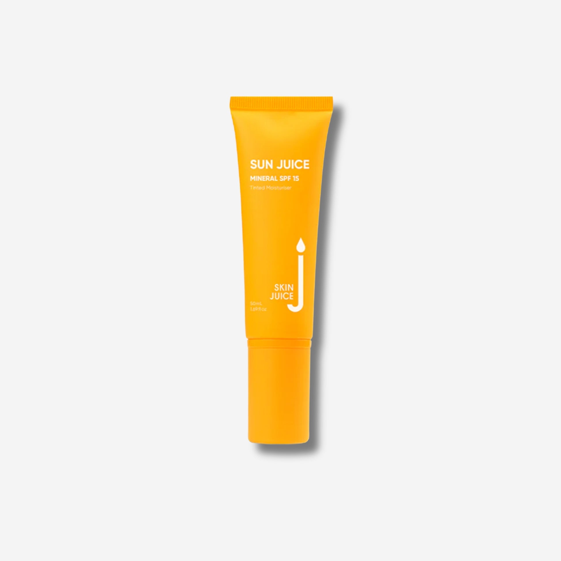 A white cosmetic tube from Naked Chemist featuring Spot Cover formula for seamless blemish coverage and skin perfection.