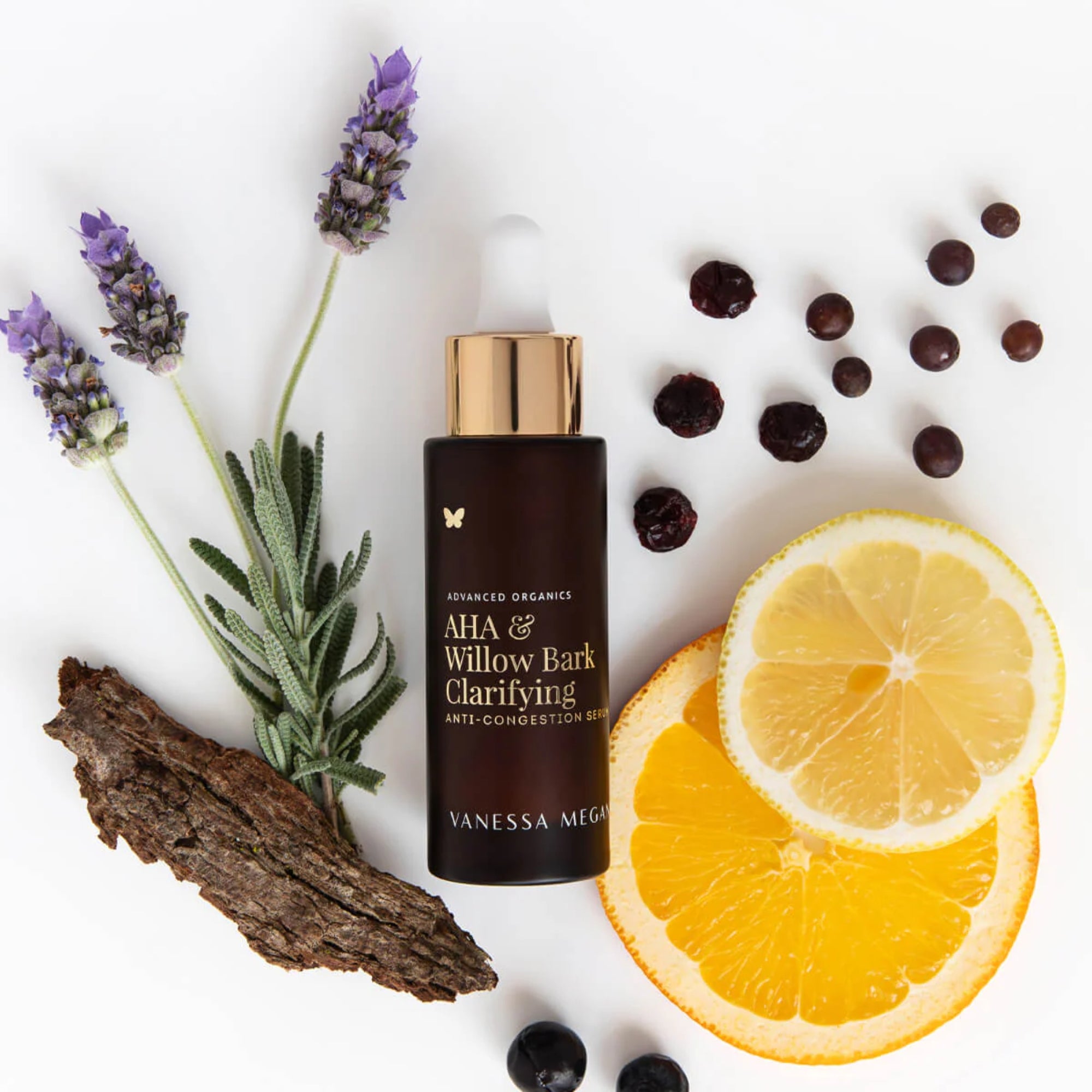 A bottle of Vanessa Megan AHA & Willow Bark Clarifying Anti-Congestion Serum with lavender, lemon, and berries on a white background