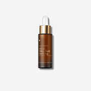 A bottle of Vanessa Megan AHA & Willow Bark Clarifying Anti-Congestion Serum with dropper on a light grey background