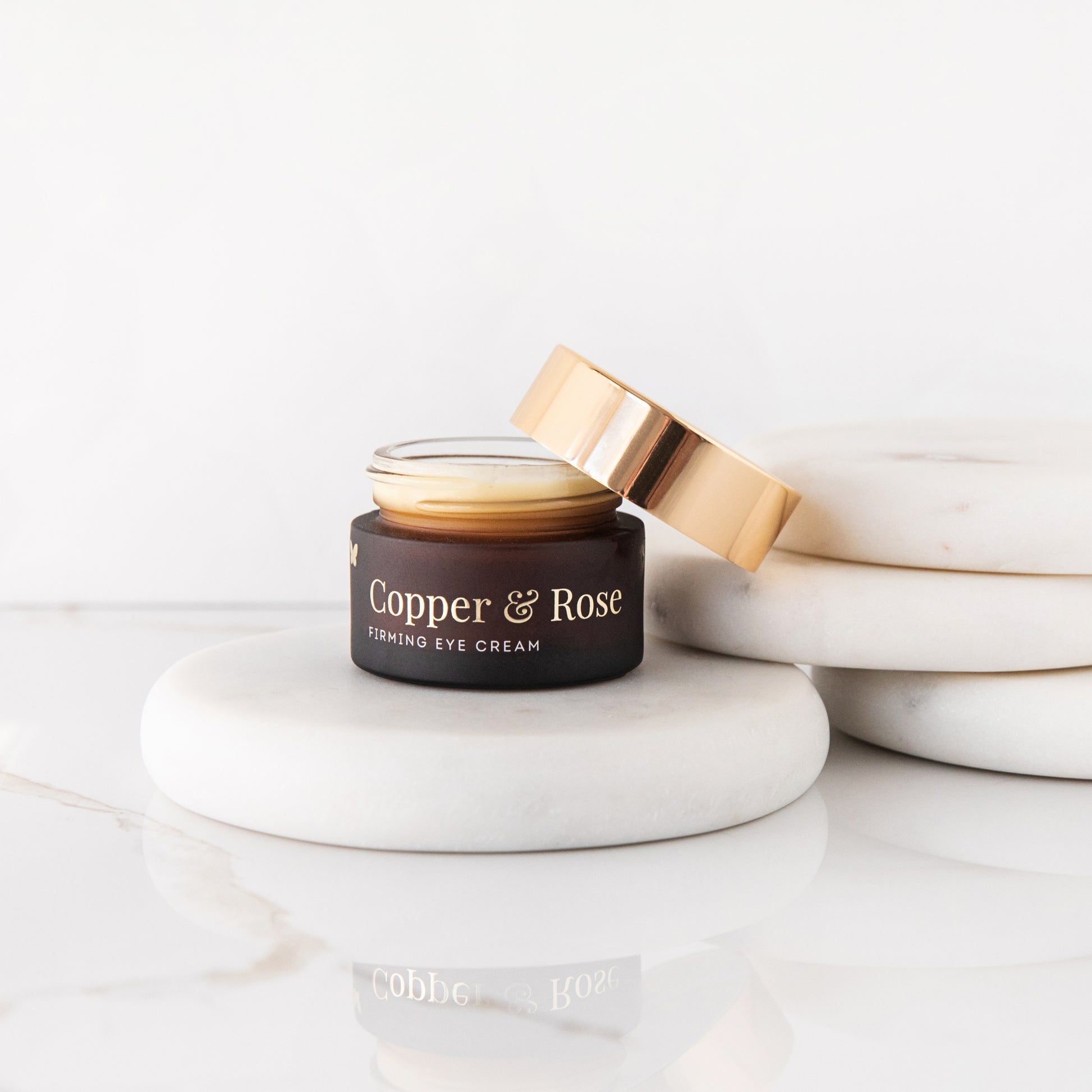 Vanessa Megan Copper & Rose Firming Eye Cream on a white surface