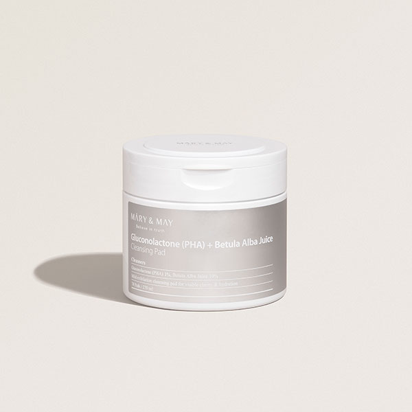 A jar of Gluconolactone (PHA) + Betula Alba Juice Cleansing Pad from Mary & May on a light beige surface.